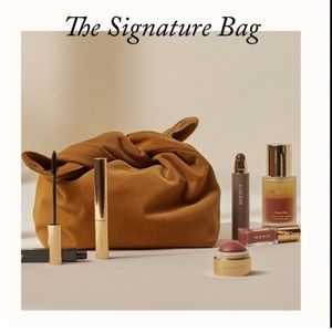 Merit beauty corduroy tie hobo bag.  Brand new condition.